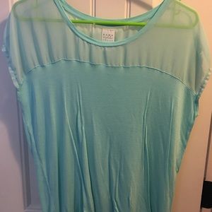 Teal colored blouse