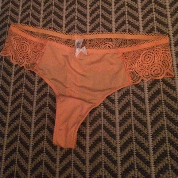 Fun, lacy orange dreamsicle color thong. - Picture 1 of 3