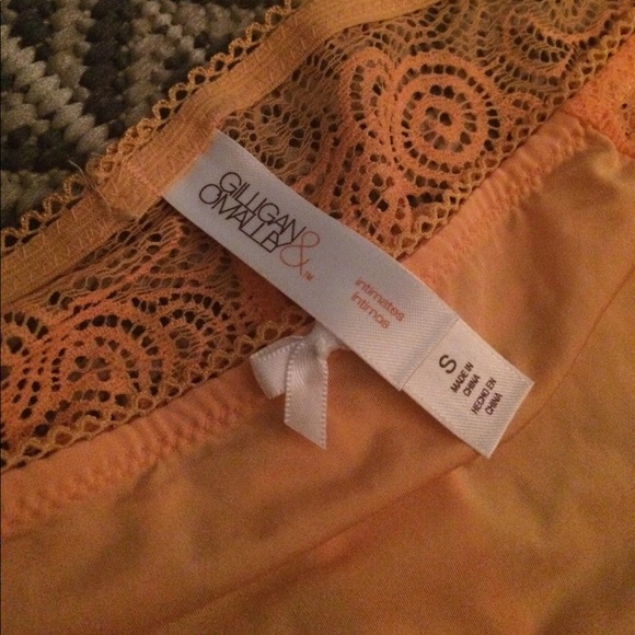 Fun, lacy orange dreamsicle color thong. - Picture 2 of 3