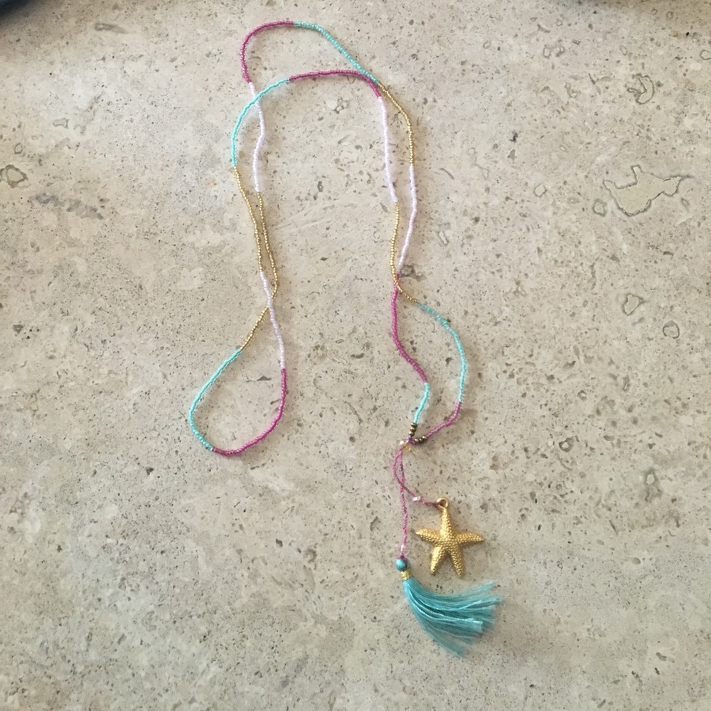 Long delicate starfish tassel necklace