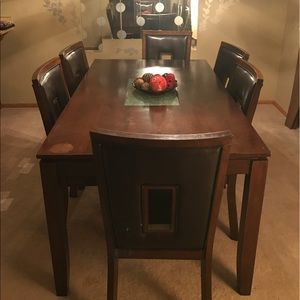 Ashley's dining table/6 chairs. Small stain, 1 y/o