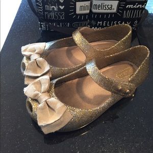 Gold mini Melissa shoes
