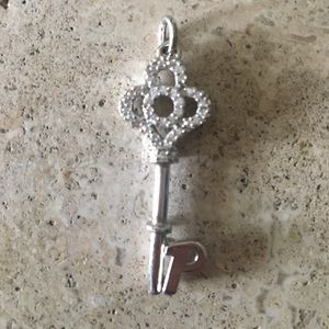 Key with P initial charm