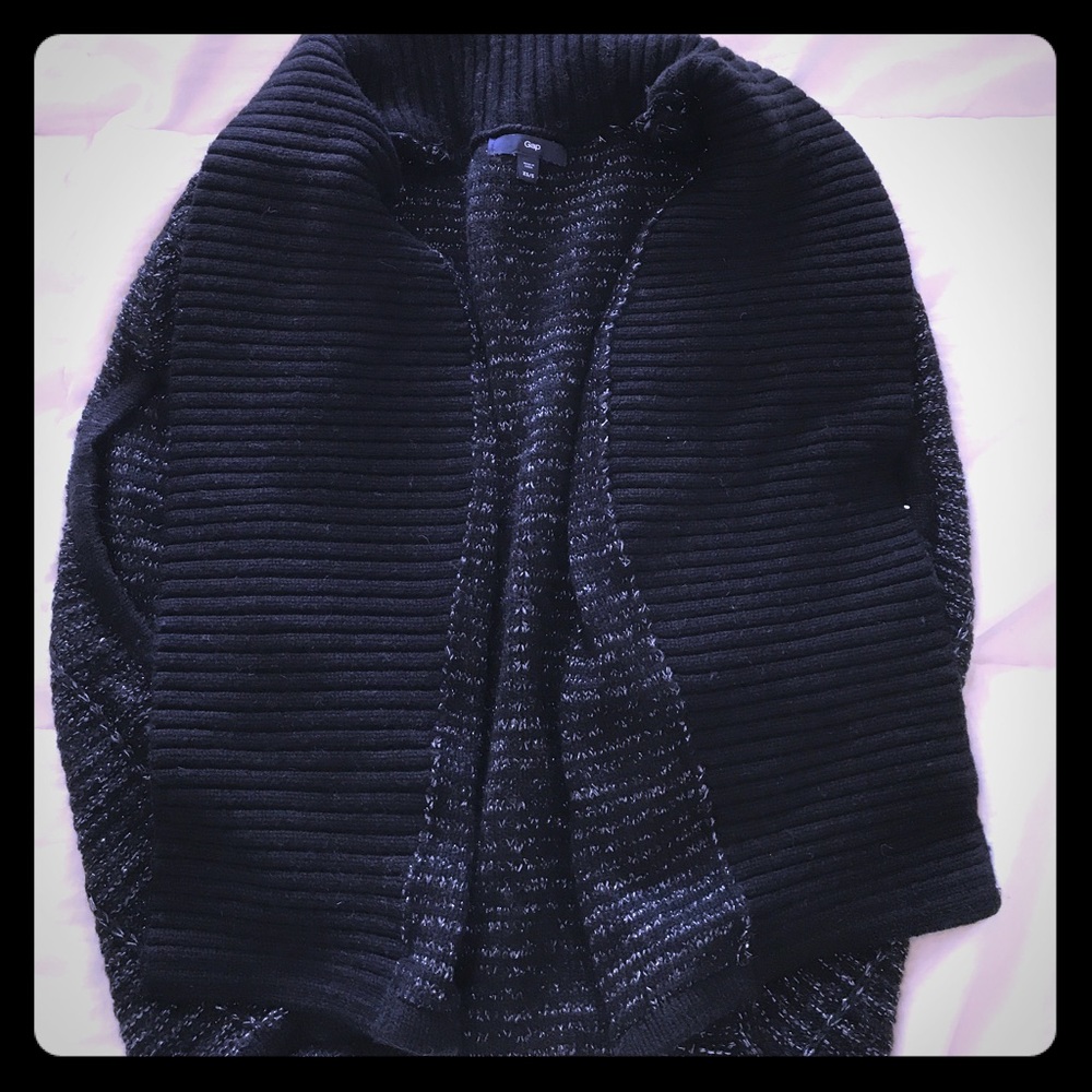 Black sleeveless sweater shrug