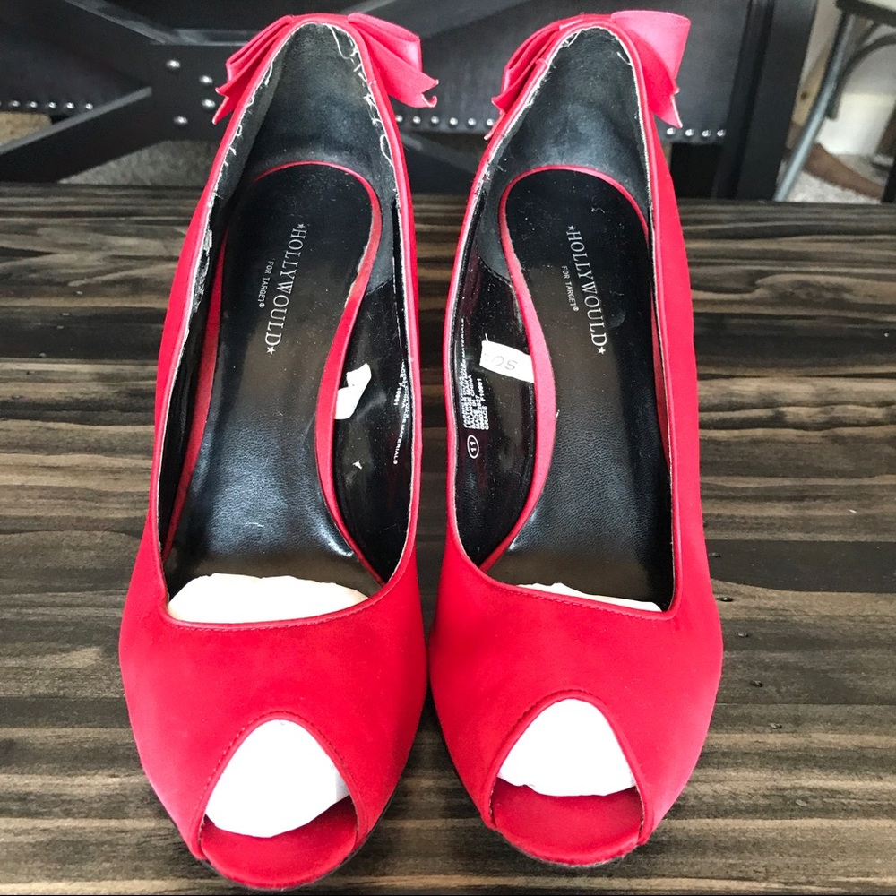 Red satin pumps