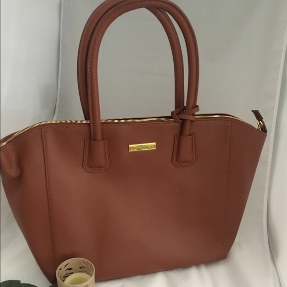 69 off Joy & Iman Handbags Joy & Iman Genuine Leather zipper city