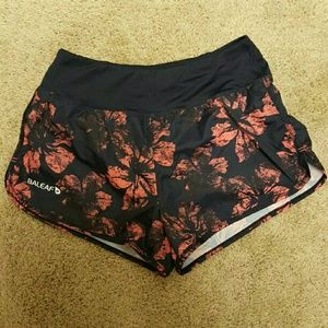 Navy and pink running shorts