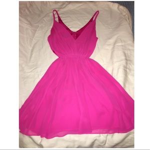 Hot pink bebe dress with side cut outs