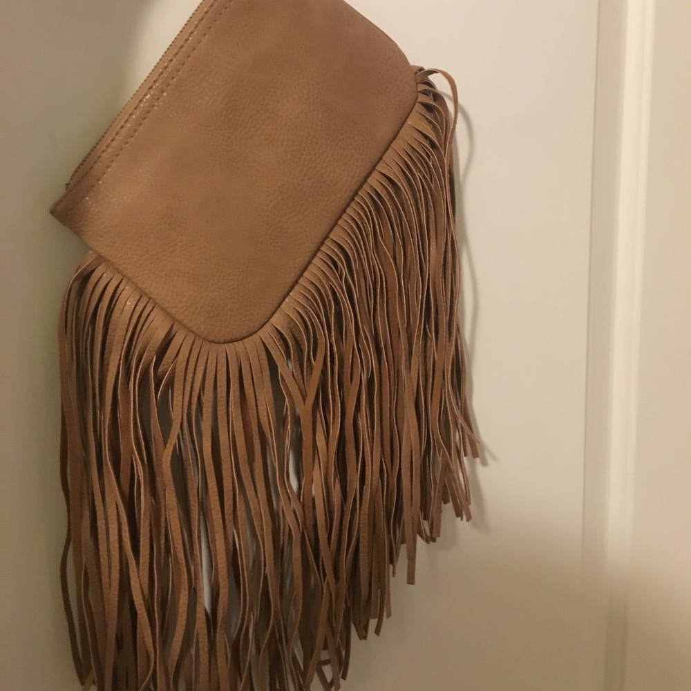 Carlos Santana Fringe wristlets