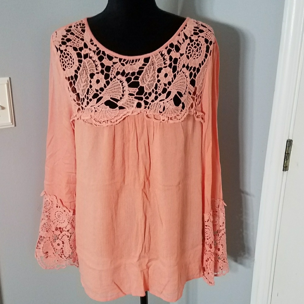 Orange bell sleeve blouse with lace detailing