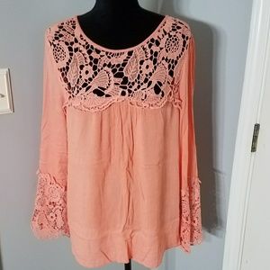 Orange bell sleeve blouse with lace detailing