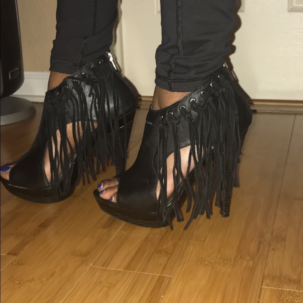 Black heels. Toe out