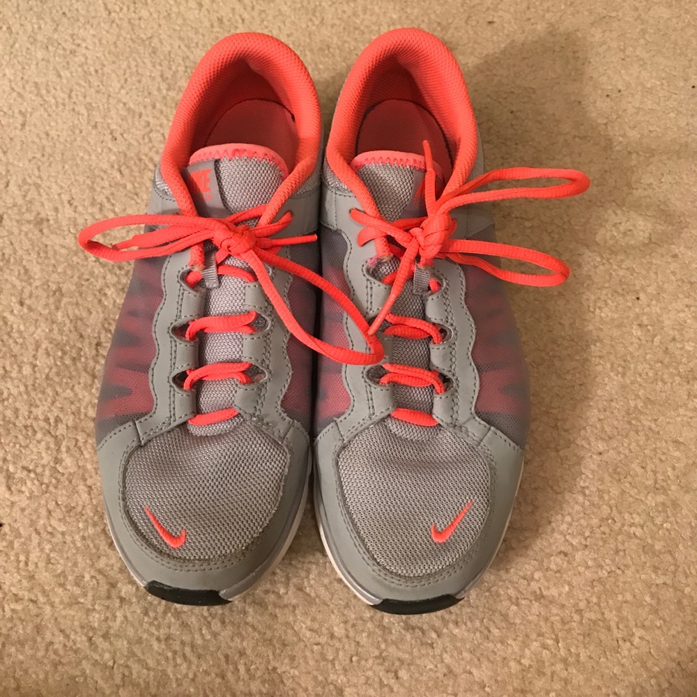 Grey and pink Nike Flex TR2 running shoes