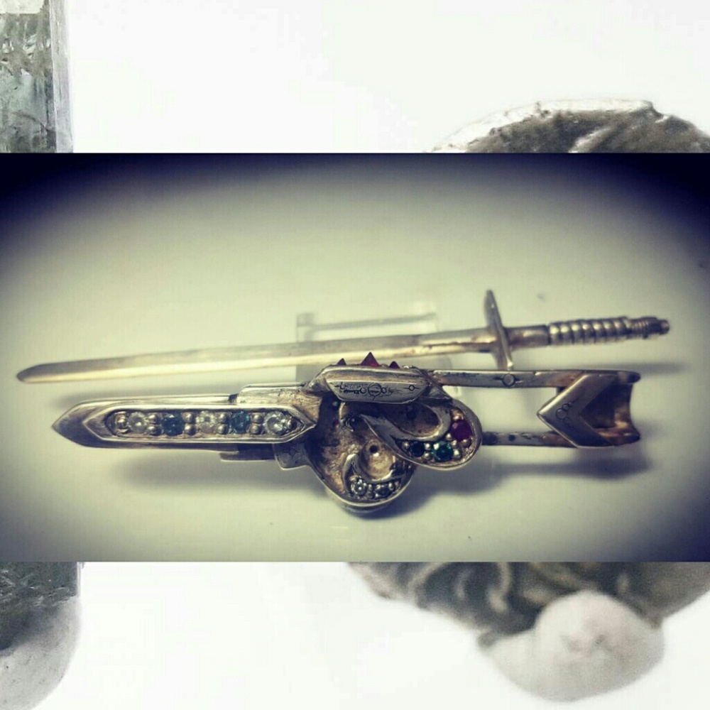Sword pendant talisman