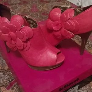 Open toed peach colored flower heels