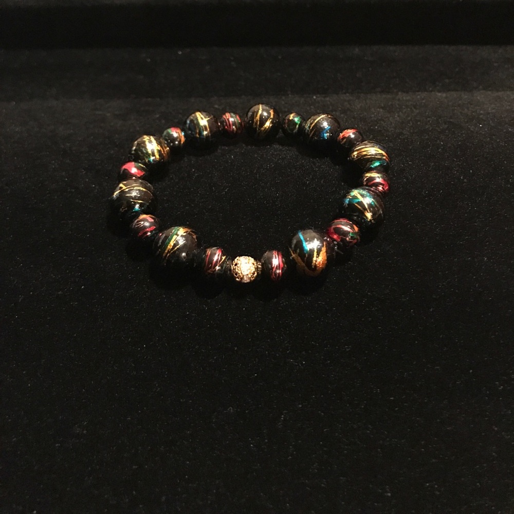Multicolored bracelet with gold accent