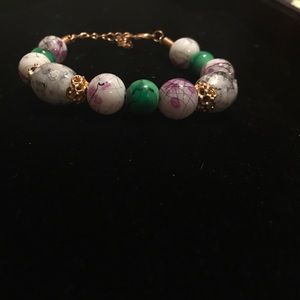 Adjustable bracelet with gold accents