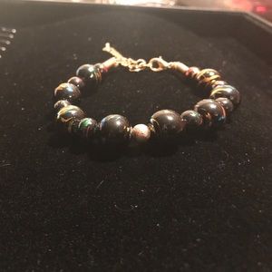 Adjustable bracelet with gold accents