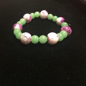 Green and purple bead bracelet