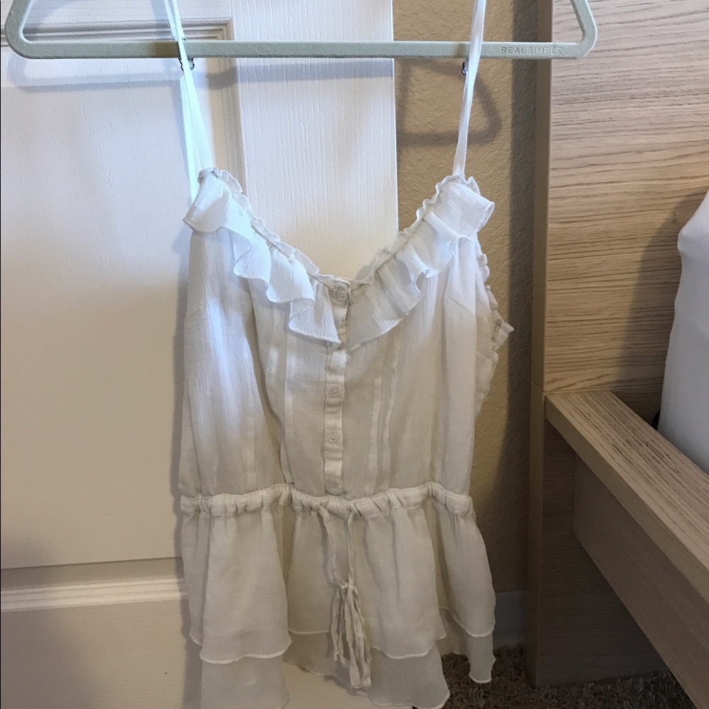 Pretty white ruffled boho peplum tank