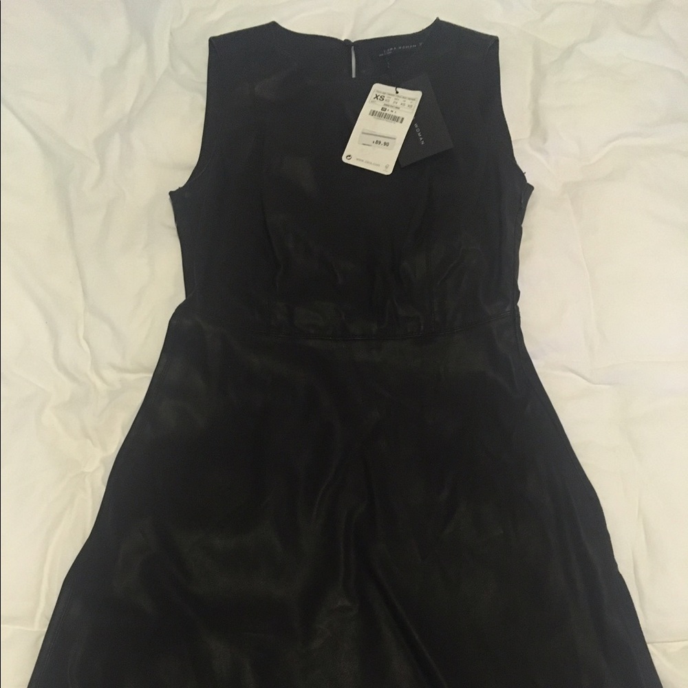 Adorable Zara vegan leather dress.