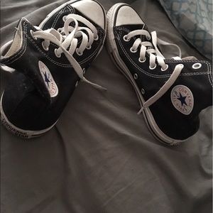 All black high top chuck Taylor's