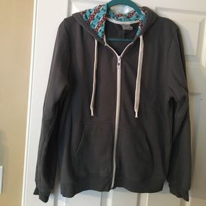 Zip up hoodie with turquoise patterned hood