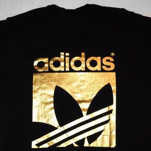 Adidas black and gold T-shirt😍