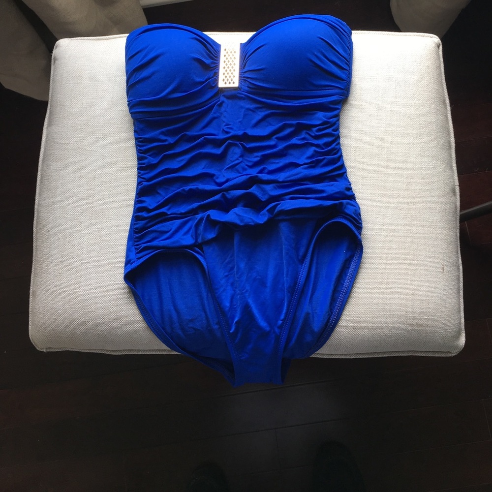 Tags and bathing suite liner still on! Brand new!