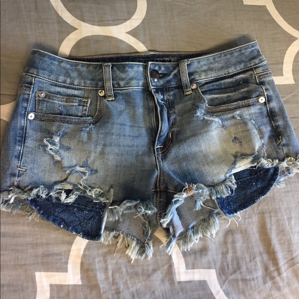 Distressed denim shorts
