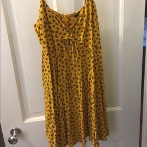 Mustard yellow sundress with black flowers