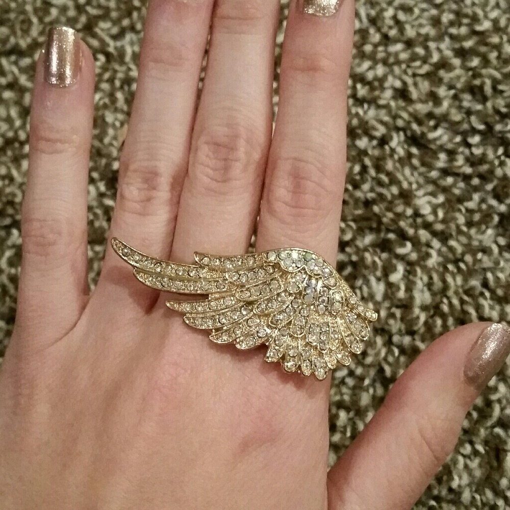 Golden wing statement ring