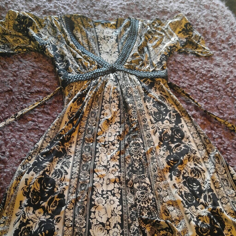 Deep v-neck empire waist dress.