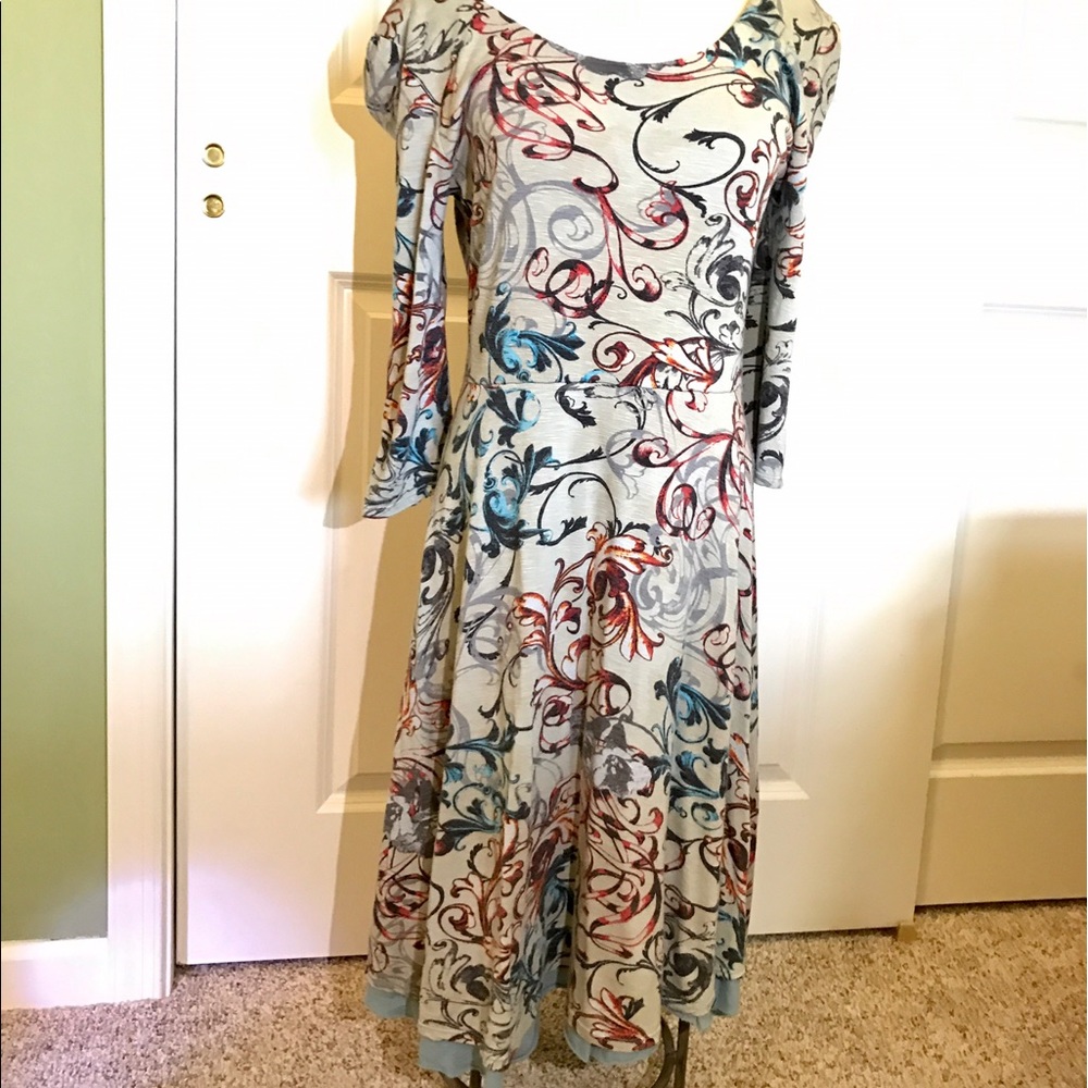 Dress by Feather clothing. Size medium.