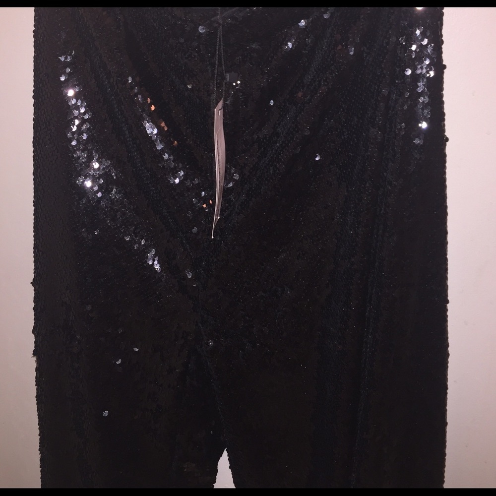Sequin wide leg pants .