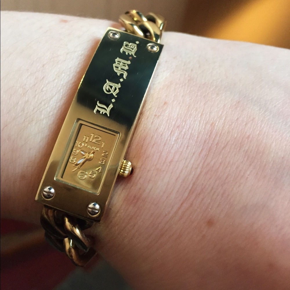 Gold watch. LAMB. Reserved