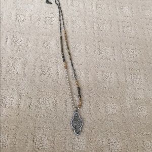 Relic pendant necklace