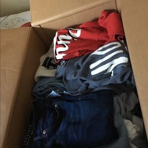 Box of name brand clothes