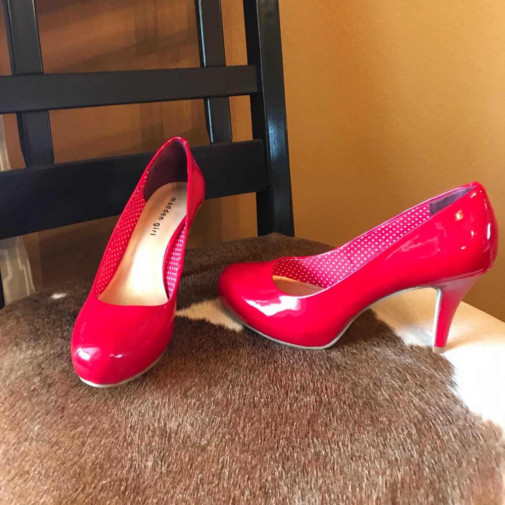 Red patent pumps