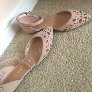 Dusty rose color flats.