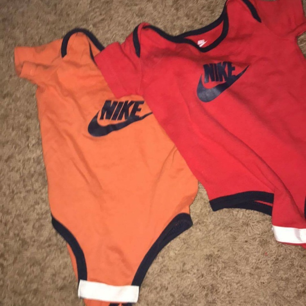 2 Nike Onesies