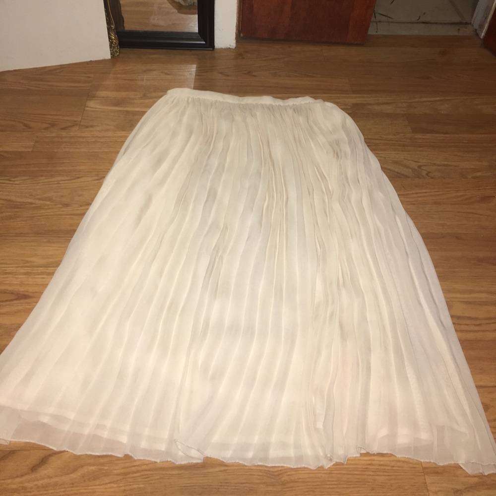 Beautiful pleated beige skirt.. Never Worn