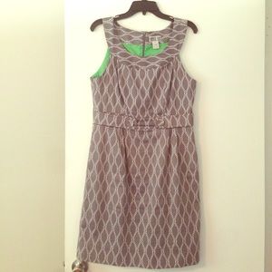 Gray dress with pockets and green lining