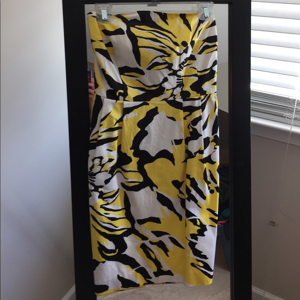 Strapless yellow, black, and white dress