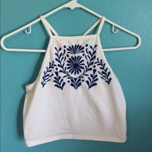pacsun white crop top with blue flower designs