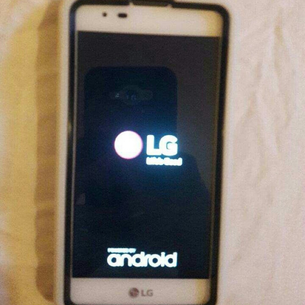 LG Android cell phone w case