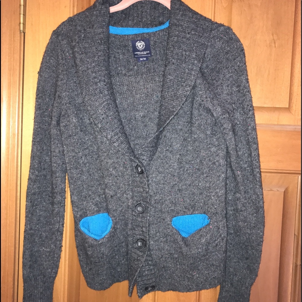 Grey long sleeve sweater.