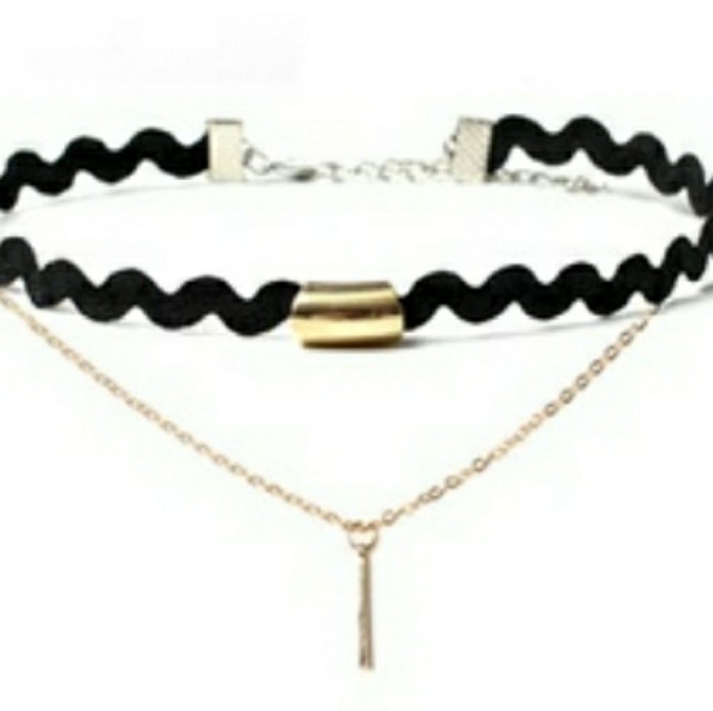 Black choker with gold accent