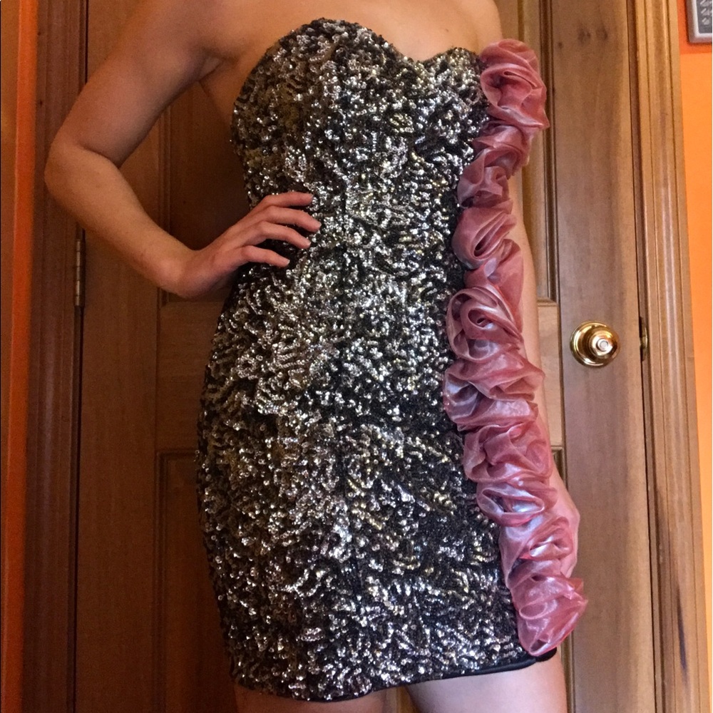 Silver sequined jovani homecoming dress.