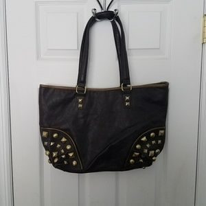 Brown leather tote with gold studs
